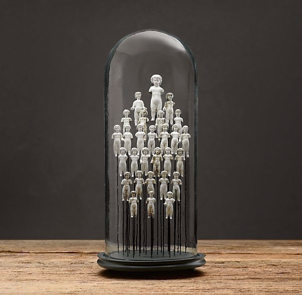 These creepy dolls trapped in a glass prison are $295.99