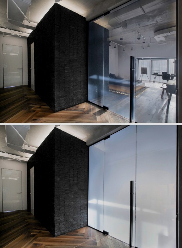 Rather than build up solid walls to provide privacy in the bedroom, the architect has used glass walls that actually change from transparent to opaque.
