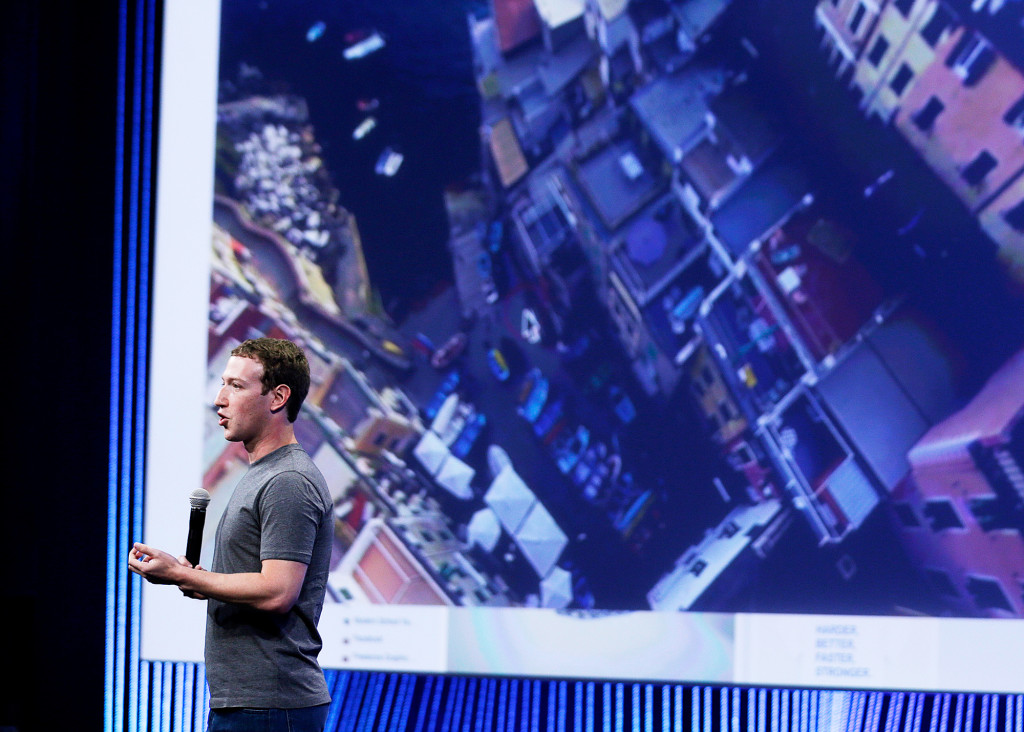 Mark Zuckerberg talks about virtual reality while delivering the keynote address during the Facebook F8 Developer Conference, March 25, 2015, in San Francisco. 