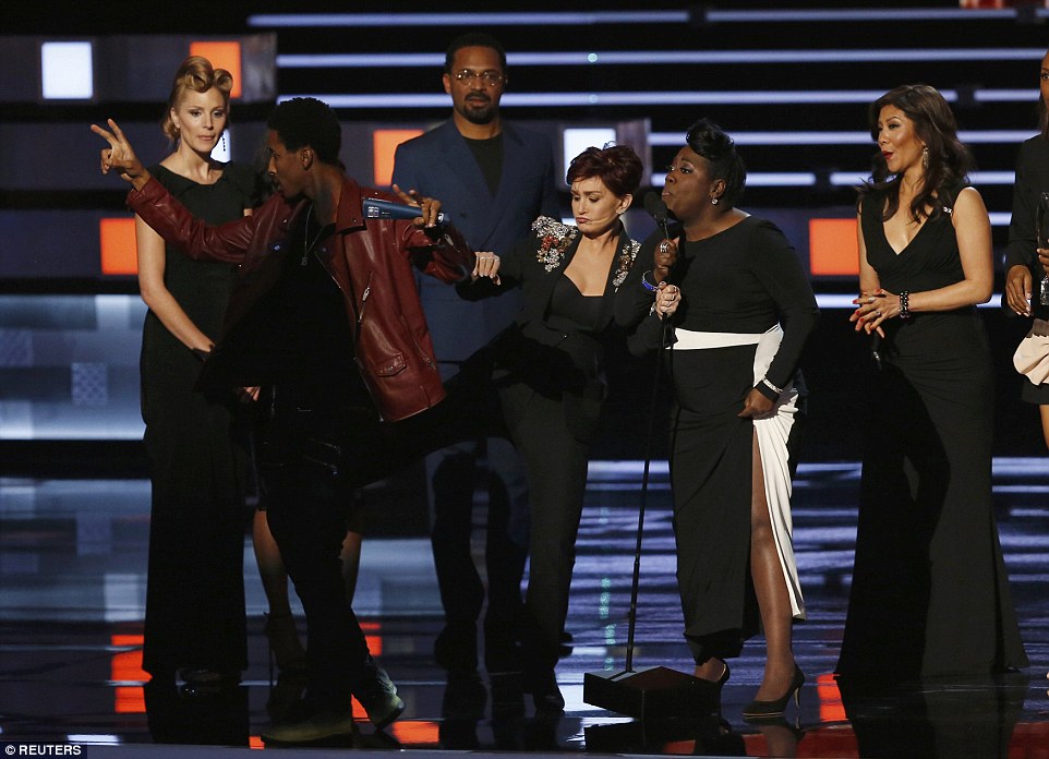 Security! The People's Choice Awards was rocked by an apparent security breach when a man ambushed the stage during The Talk panel's thank you speech
