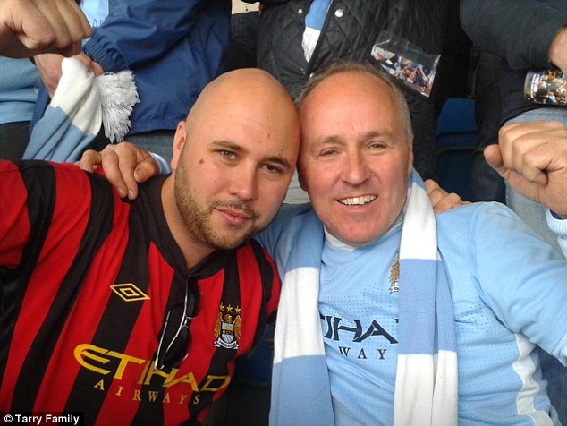 Sports fan: The band's manager Craig Tarry, 33, pictured alongside his father at a football game, also died in the crash in Sweden on February 13