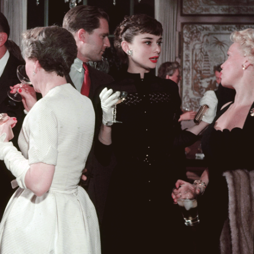 Audrey Hepburn and friends at a party held at Claridge’s,...