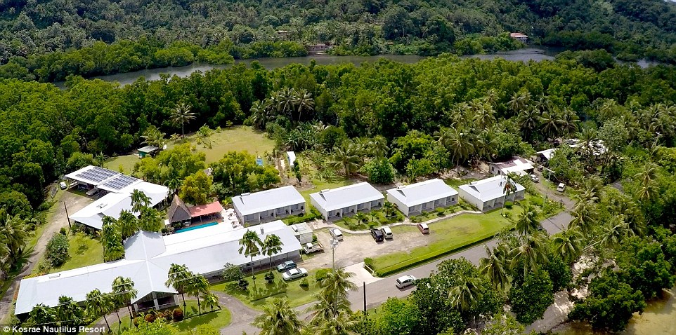 The 16-room hotel (pictured) is situated in tropical gardens, with all bedrooms coming with two double beds, air-conditioning, 22-channel cable TV, a minibar and access to the resort's pool