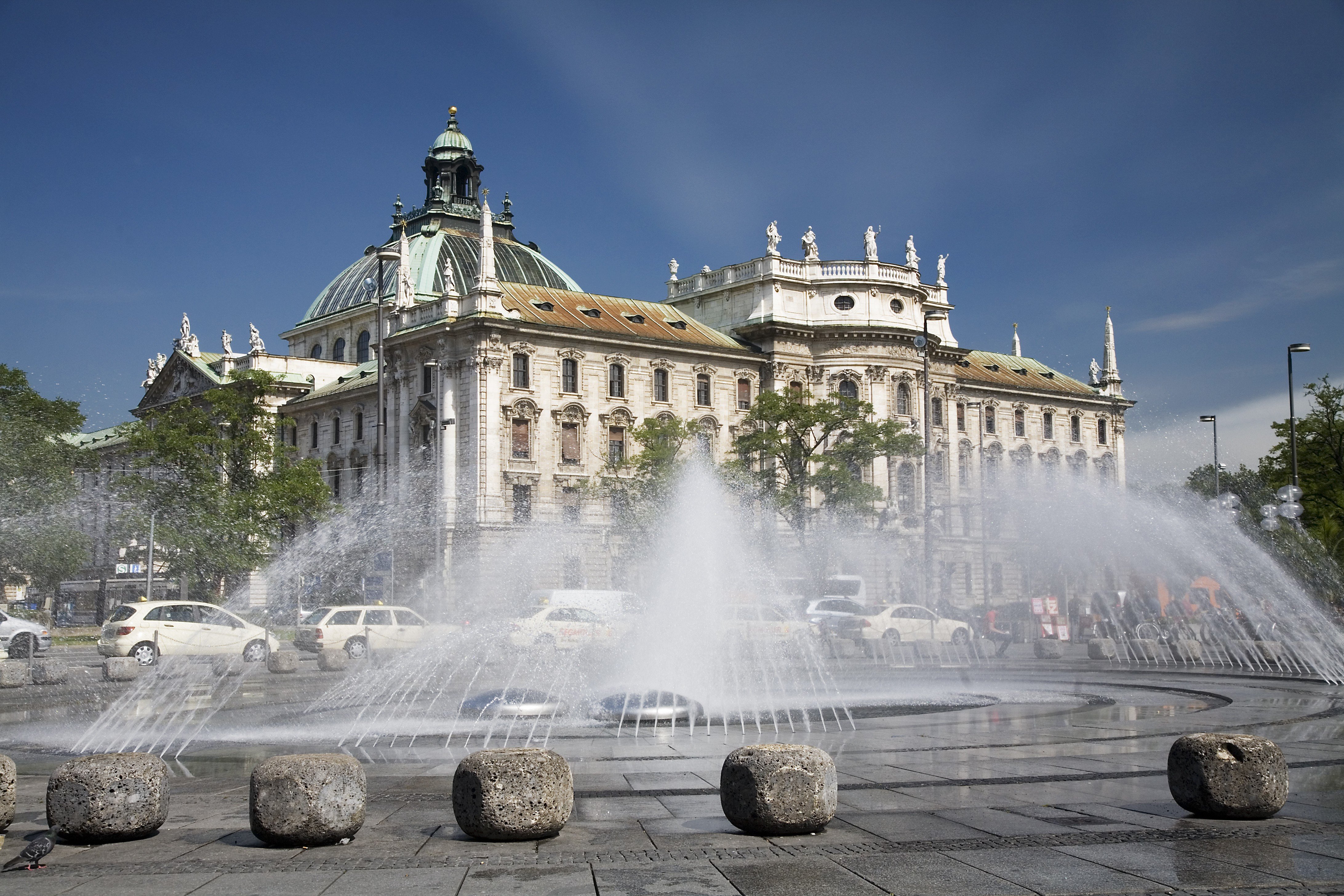 Water fountain in front of the Justizpalast near Karlsplatz. Munich, Germany