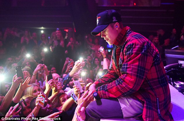 In his element: The singer performed in front of a bevy of female fans on Wednesday night