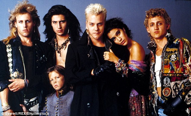 Iconic: Brooke (far L) starred in the beloved 1980's film The Lost Boys, which is about a gang of vampires in Northern California