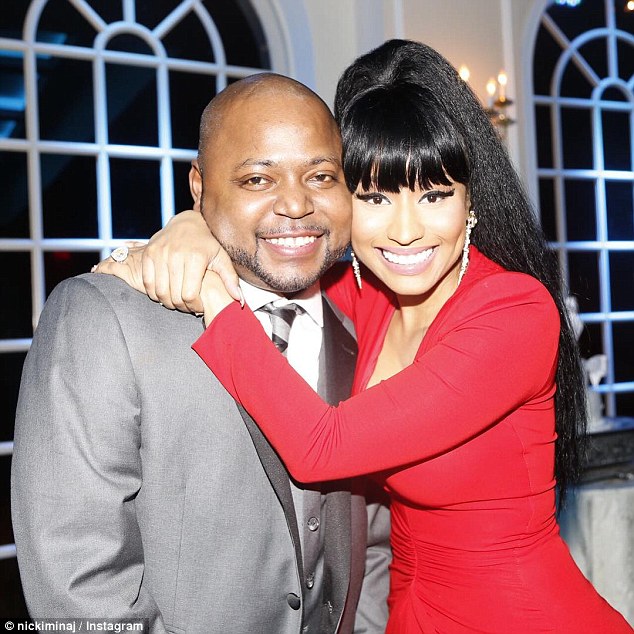 Bailed him out: Nicki Minaj has reportedly posted $100,000 bond for her brother Jelani Maraj who was being held in Nassau County, New York, after being charged with raping a preteen. She's pictured with him in August