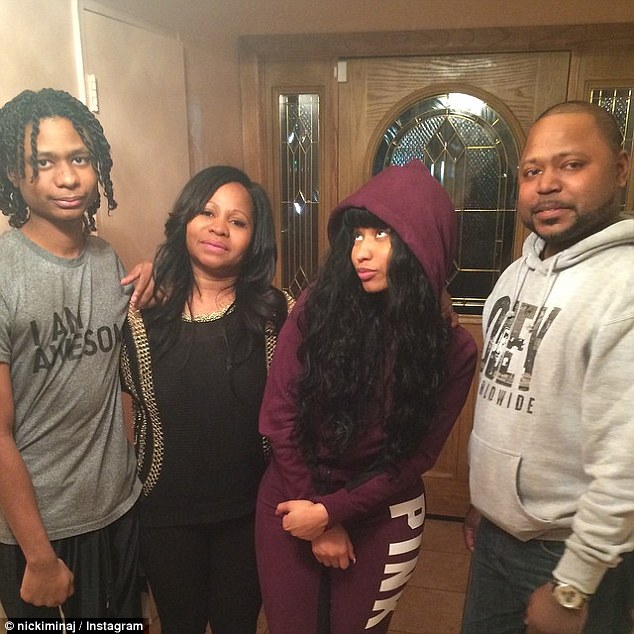 Flesh and blood: Nicki posted two homes she owns as collateral for Jelani's bond. She's pictured with her mother Carol and younger brother Micaiah, left, and Jelani, right in this social media photo 