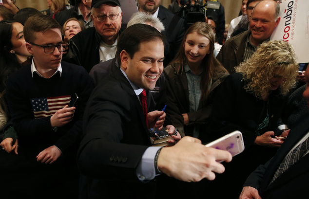 Republican presidential candidate, Sen. Marco Rubio, R-Fla., poses for a photograph at a campaign rally in Shelby Township, Mich., Wednesday, March 2, 2016. ...