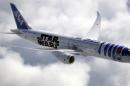 Artist image released by All Nippon Airways on April 17, 2015 shows the airline's Boeing 787-9 aircraft painted to look like Star Wars robot R2-D2