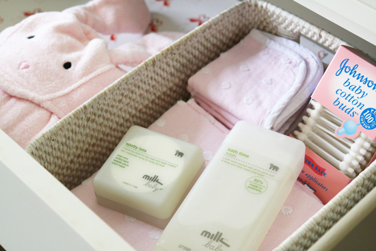 Use removable baskets to organize your baby's dresser drawers, from I Heart Organizing. 