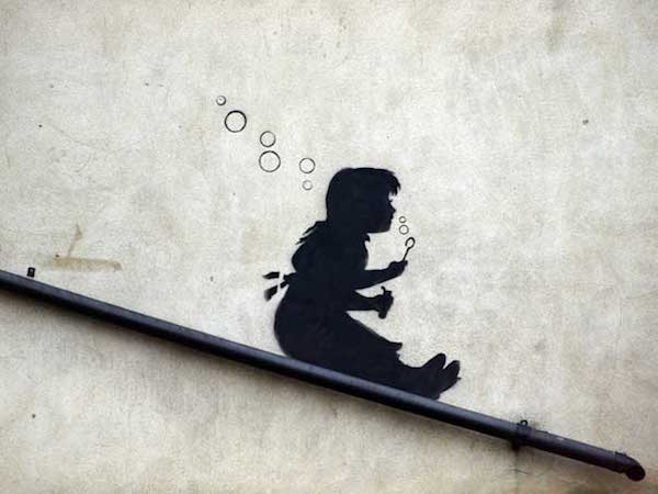 banksy-graffiti-street-art-sliding-girl