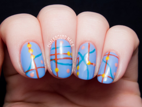 Embrace your wanderlust with abstract road map nail art!
