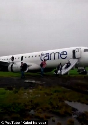 Passengers were filmed evacuating from the aircraft by the emergency slide and onto the grass