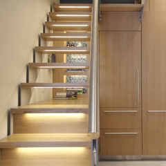 A Manhattan apartment with an airy staircase. 