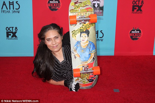 Red carpet: Rose used a skateboard to get around; she is seen at the Chinese Theatre in Hollywood last year
