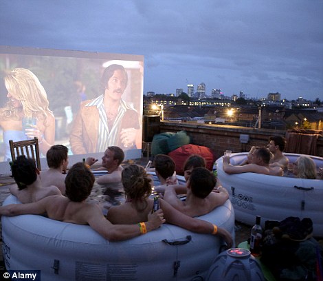 Could there be a more fun way to watch a film with your friends, than in a hot tub overlooking Shoreditch in London?