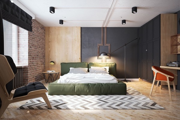 The bedroom, which blends together several textures including the exposed brick, feels so unique. There's contemporary design mixed with art deco geometry. Modern chevron blends expertly with midcentury hues of orange and green.