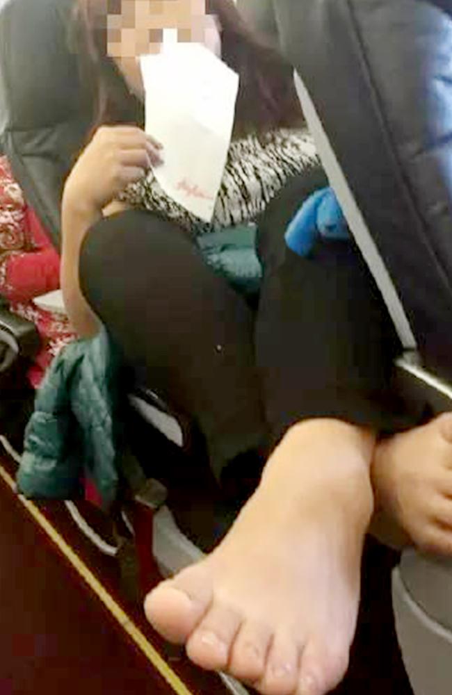 The affected passenger who took the photo claimed she was too afraid to say anything.