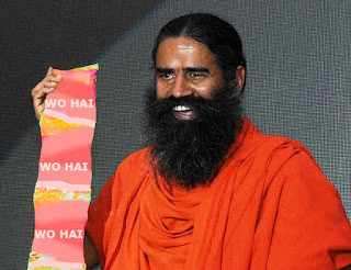 Ramdev showing the design of new packets