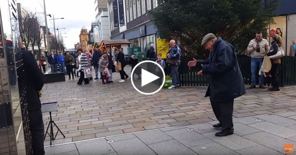 let-this-elderly-man-dancing-to-a-street-performing-saxophonist-brighted-your-day