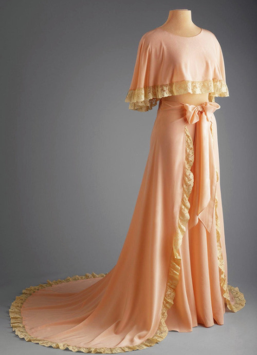 Dressing Gown- Two piece negligee of peach colored silk edged...