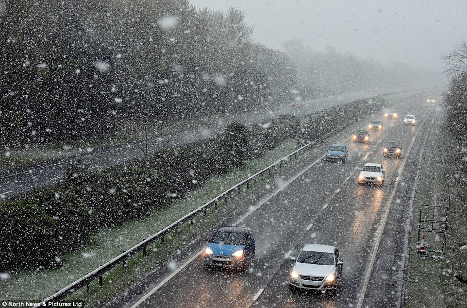 Thunder, lightning and sleet showers are expected with some in northern areas witnessing heavy snowfall. Pictured: Heavy snow falls across Teesside, Middlesbrough, making for tricky driving conditions