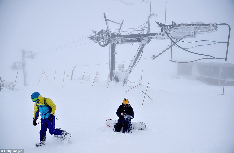 Chilly skiers enjoy the fresh snow at Cairngorm ski centre in Scotland. CairnGorm Mountain's general manager Janette Jansson said: 'We are absolutely delighted to continue offering great snowsports at CairnGorm at the moment'