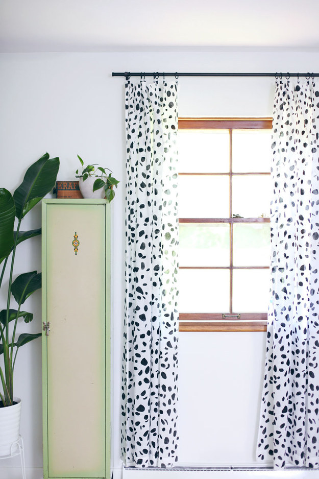 Upgrade your plain white curtains with a simple paint job.