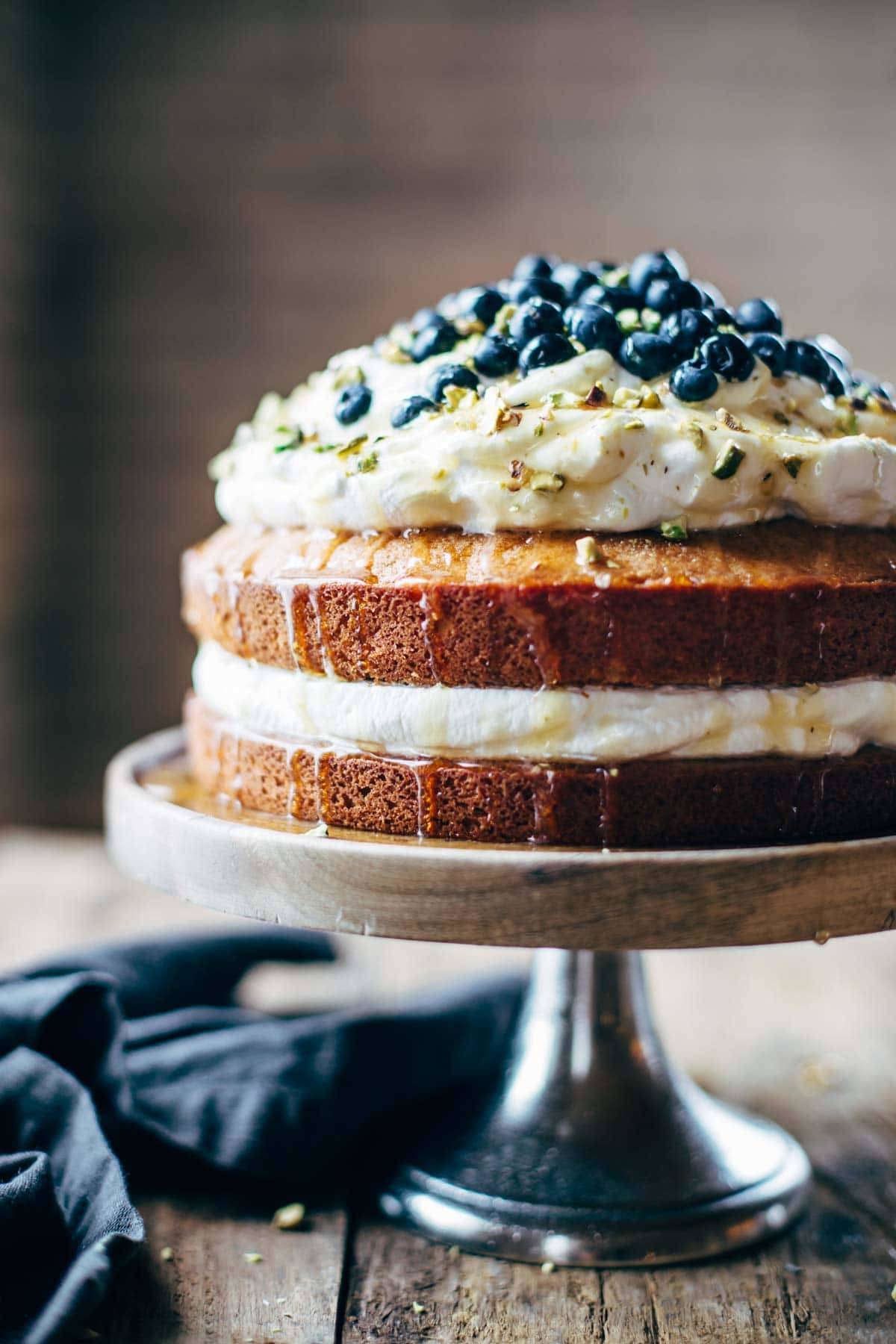 Orange Brunch Cake - SUPER YUMMY because it's made with olive oil and whole oranges! topped with whipped cream and blueberries and you're in fancy brunch business. | pinchofyum.com