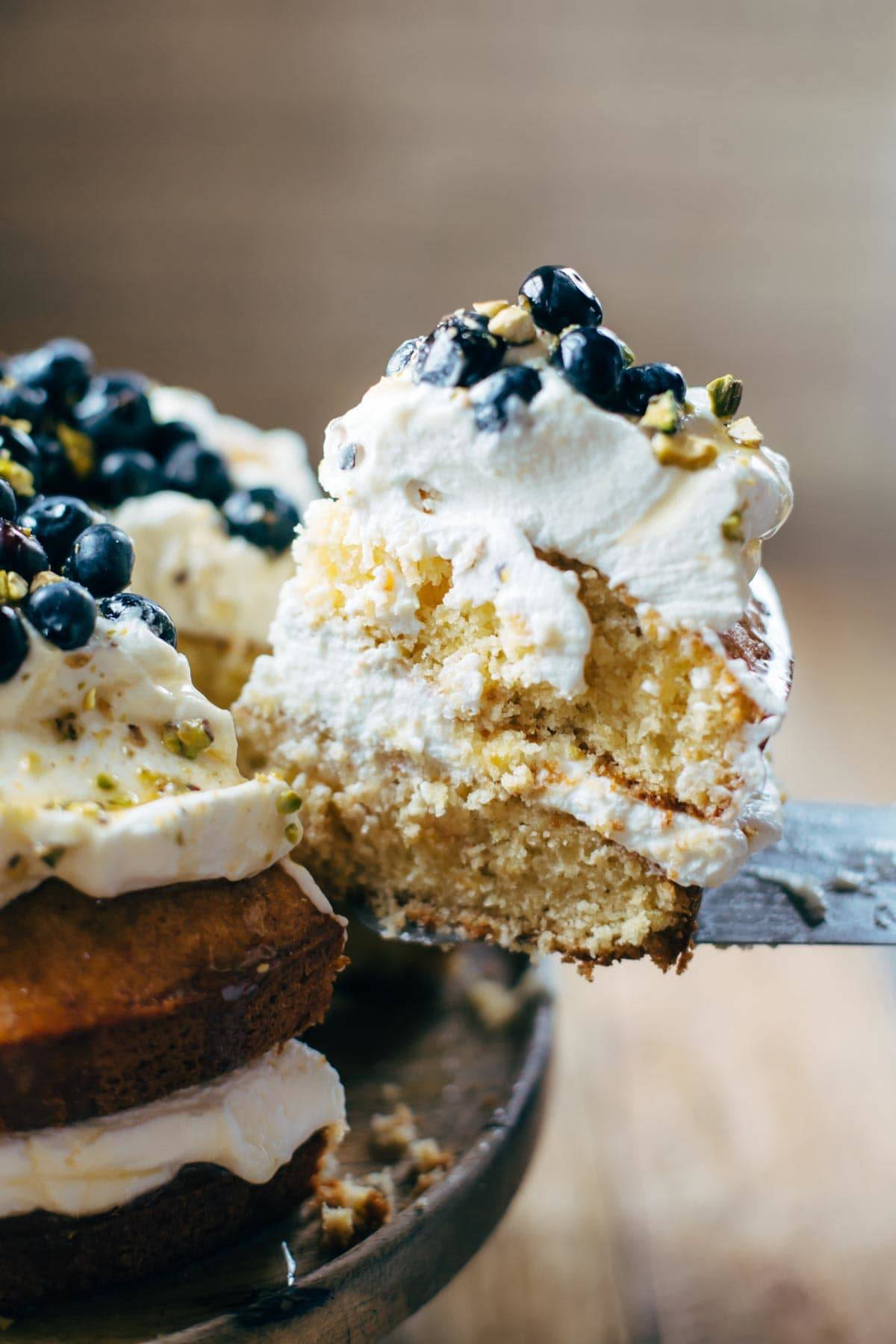 Orange Brunch Cake - SUPER YUMMY because it's made with olive oil and whole oranges! topped with whipped cream and blueberries and you're in fancy brunch business. | pinchofyum.com