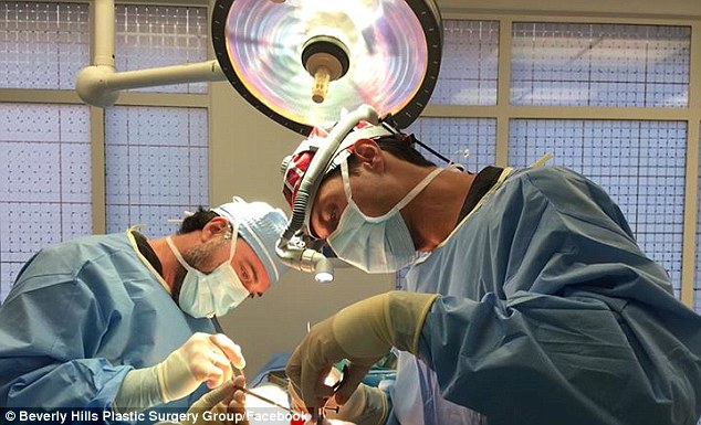 Dr. John Layke (R) and his partner Dr. Payman Danielpour (L) of the Beverly Hills Plastic Surgery Group warned Kristen that if she didn't have surgery, her face 'would have severe facial asymmetry'