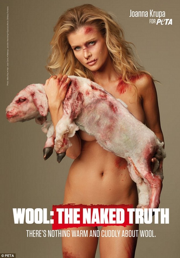 Made a statement: Naked Joanna Krupa stars in a new poster for PETA, published Tuesday