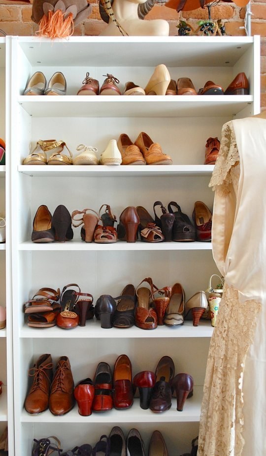 A bookcase disguised as custom built-in shoe shelves.