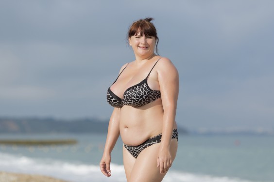 Beach Body: Woman Smiling on the Beach