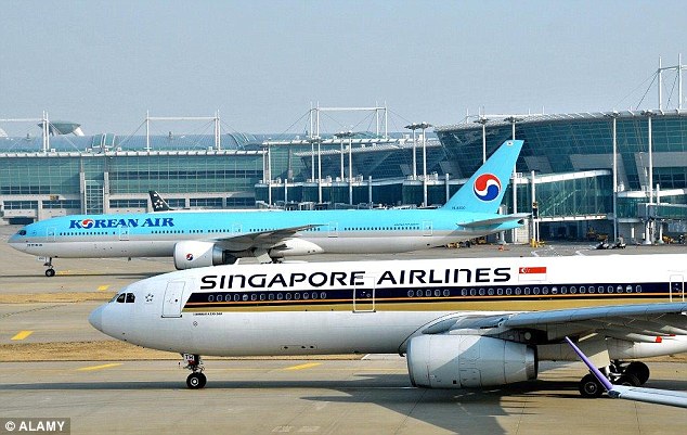 A Singapore Airlines plane was forced to reject take-off while travelling at 120mph when a Korean Air Airbus crossed the runway in front of it