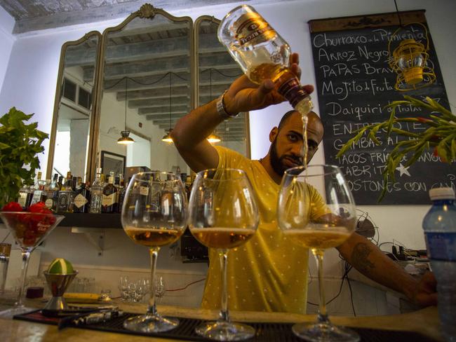Private bars are flourishing in the wake of increased interest in travel to Cuba. Picture: AP Photo/Desmond Boylan