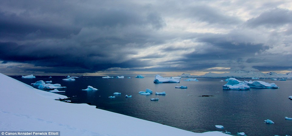 As if by magic: Gradually, the thick clouds rolled away and electric blue ice sculptures appeared on the horizon 