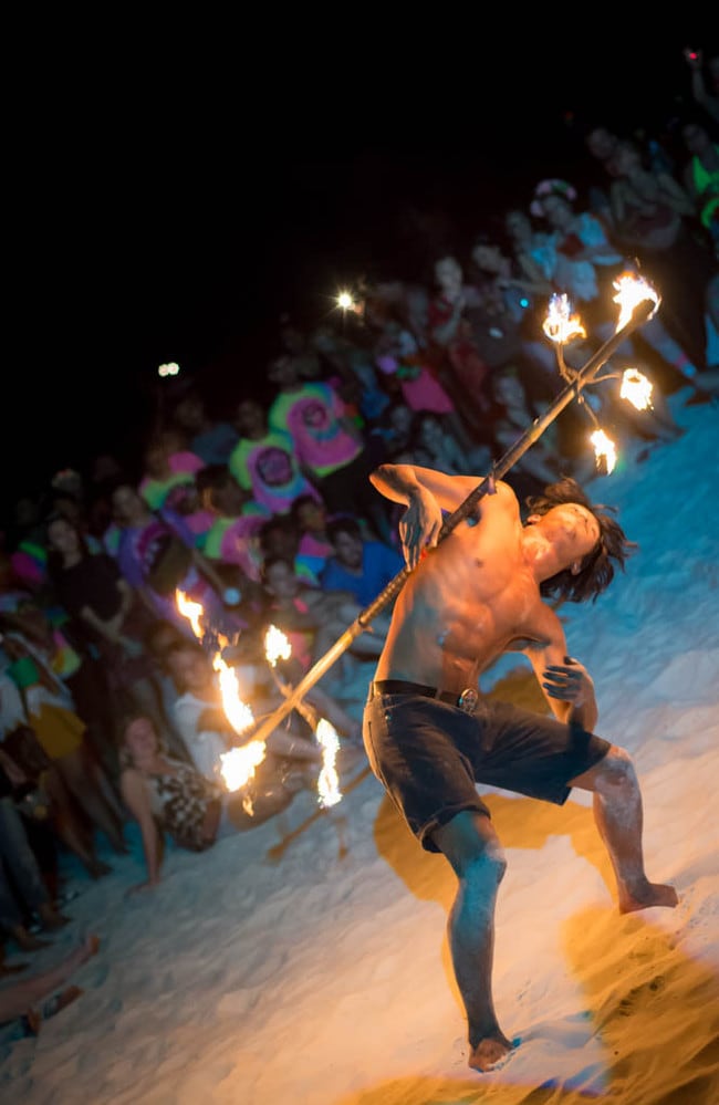 Fire twirling experts all along the beach. Picture: Tommo Williams
