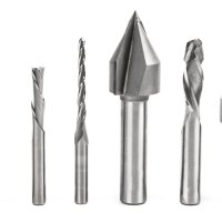 From left to right: straight flute, upcut, downcut, ballnose, V-bit, compression, and table surfacing bits.