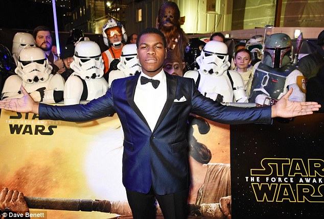 Already a hit: Newcomer John Boyega, who stars as stormtrooper Finn, held court at the film's premiere in Leicester Square in London on Wednesday