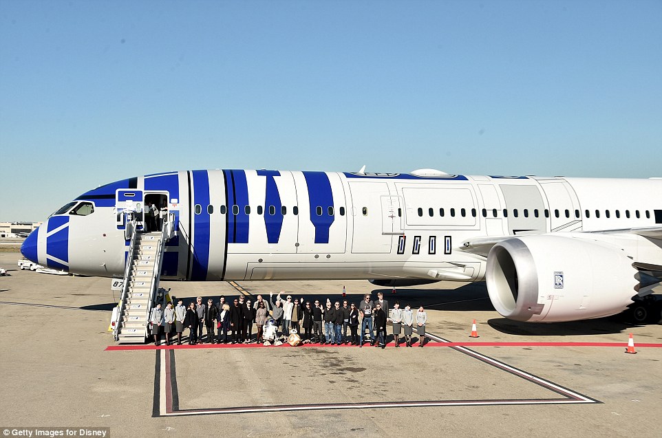 Where's the Millennium Falcon? The entire cast of Episode VII were pictured boarding an R2-D2 themed jet, with the fuselage and cockpit painted in the blue pattern of the beloved droid, at the Los Angeles International Airport