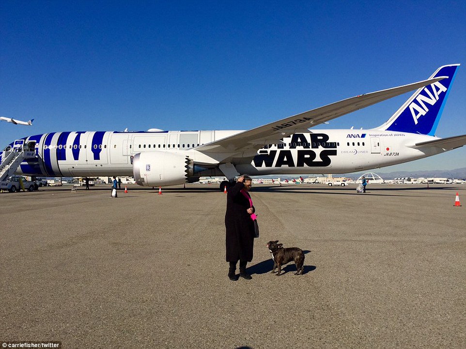 Bringing her own Ewok: Carrie Fisher took her pup along for the ride on Tuesday as well