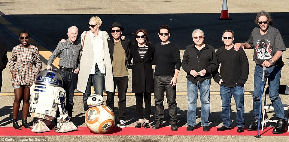 Is there a Sith among them? The cast looked thrilled to be boarding the private jet along with the droids