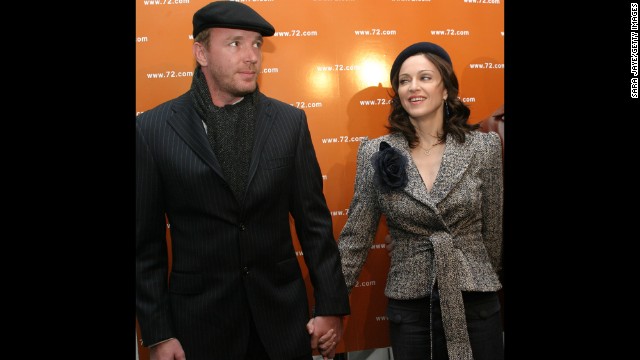 Then-husband Guy Ritchie and Madonna attend the launch party for "The 72 Names of God," a book by Rabbi Yehuda Berg, the co-director of The Kabbalah Center, at the New Museum for Contemporary Art in New York on April 24, 2003. Madonna's interest in Kabbalah, a mystic branch of Judaism, was widely discussed at this time.