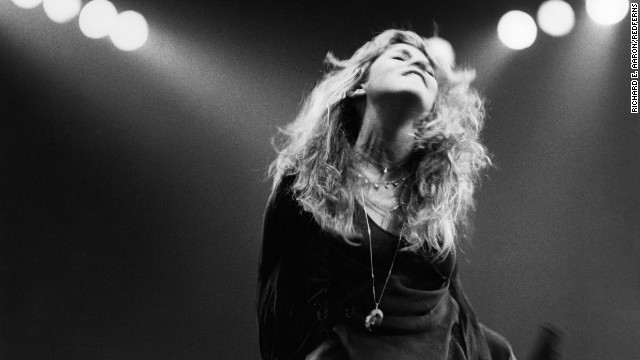Singer and songwriter Stevie Nicks performs on stage. She joined Fleetwood Mac in 1974 with her then-boyfriend Lindsey Buckingham.
