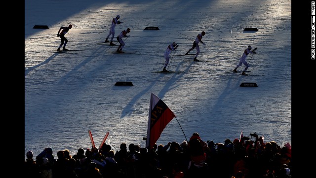 Cross-country skiers compete in the finals of the men's sprint event February 11.