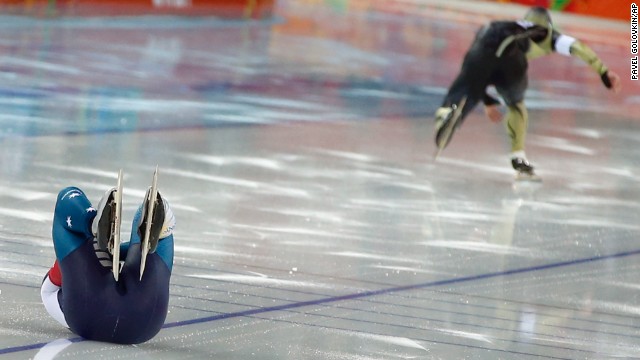 Australia's Daniel Greig crashes February 10 in the first heat of his 500-meter speedskating race.