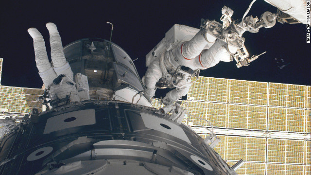 The crew of the space shuttle Endeavour initiates the station's first assembly sequence in 1998. The International Space Station includes several large modules, each launched separately and connected in space by astronauts.