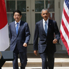 President Obama and Japanese Prime Minister Shinzo Abe approach the podiums for a joint press conference Tuesday at the Rose Garden of the White House in Washington. President Obama is hoping to finalize a new trade agreement with Japan and other Asian nations soon.